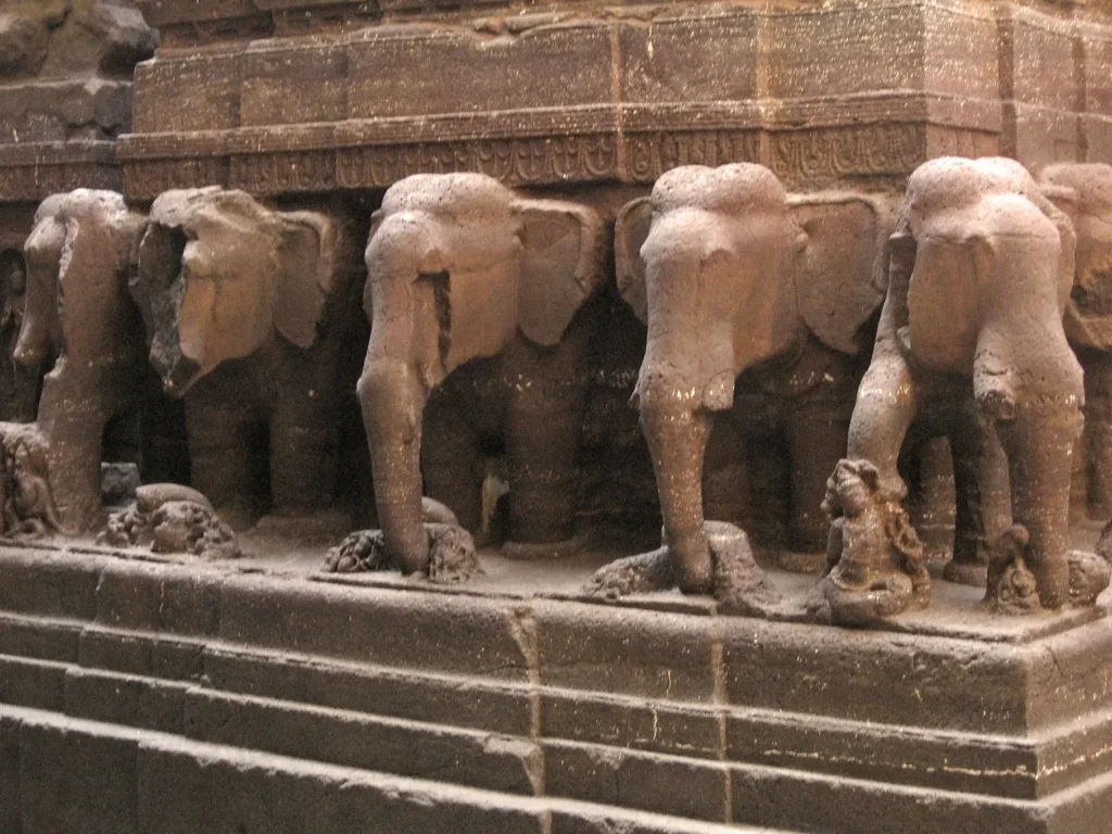 CARVED SCULPTURE OF ELEPHANT IN THE PLINTH