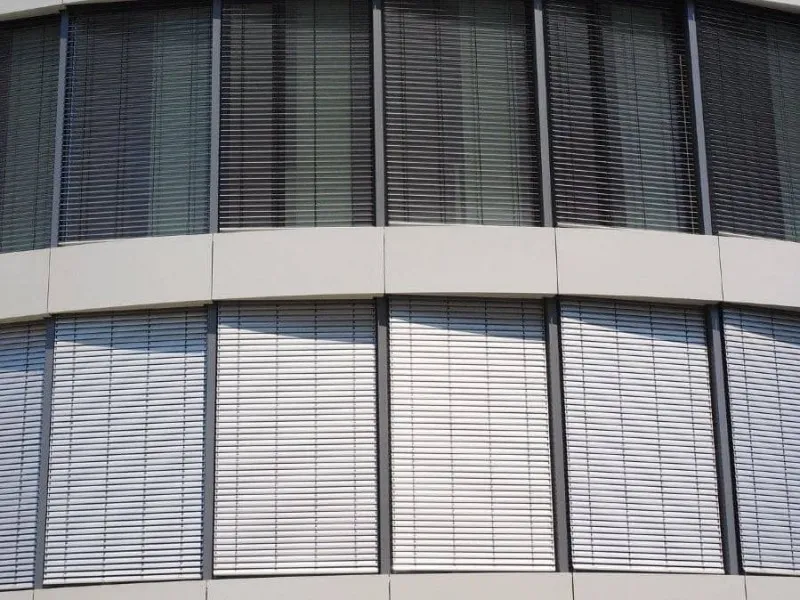 SHADE PROVIDED BY STATIC OR MOVEABLE EXTERNAL BLINDS